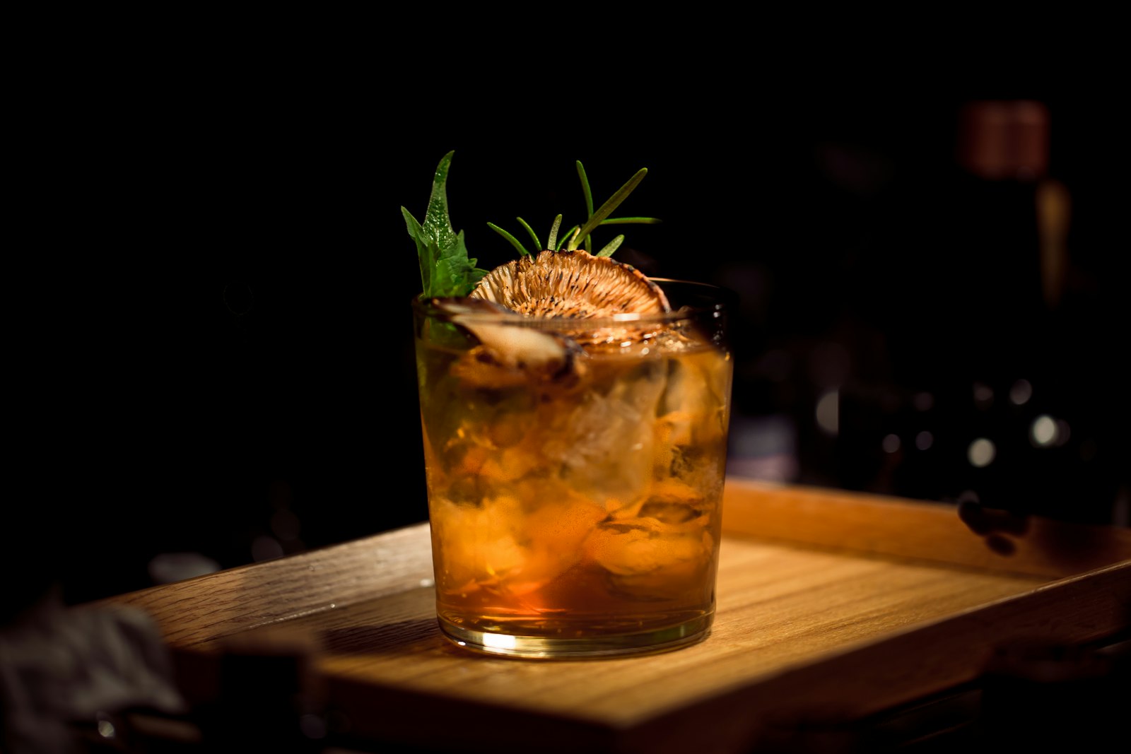 A skilled bartender crafting drinks at a private event